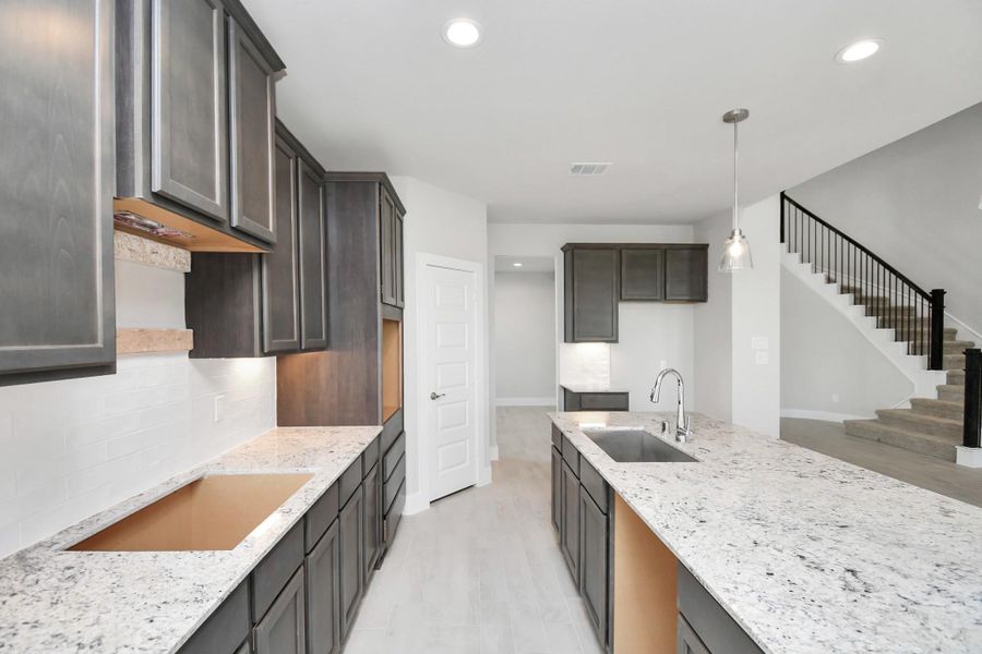 Sample photo of completed home with similar floor plan. Actual colors and selections may vary.