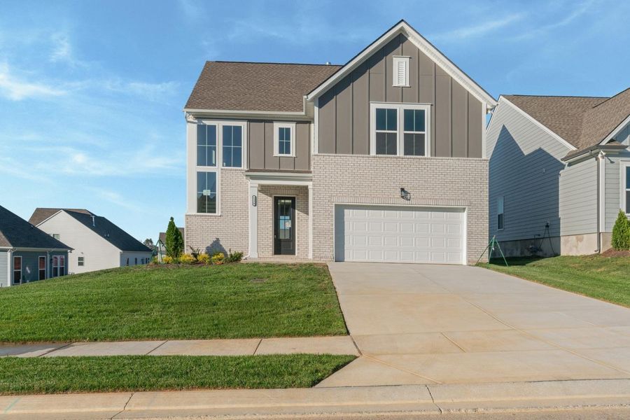 Front exterior of a new home in Woodbridge Glen, Lebanon, TN, highlighting curb appeal (Image 1).