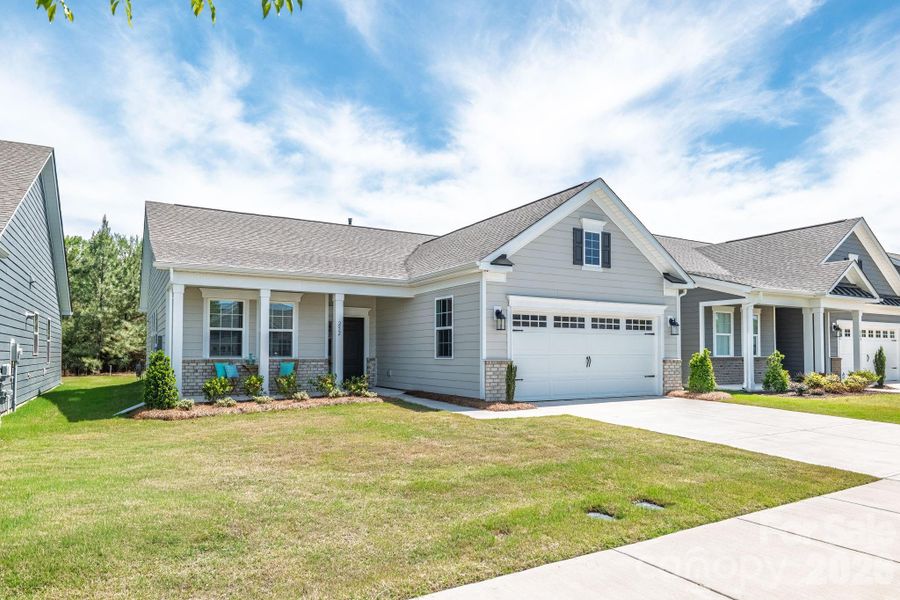 Front exterior of a new home in Esplanade at Northgate, Indian Trail, NC, highlighting curb appeal (Image 25).