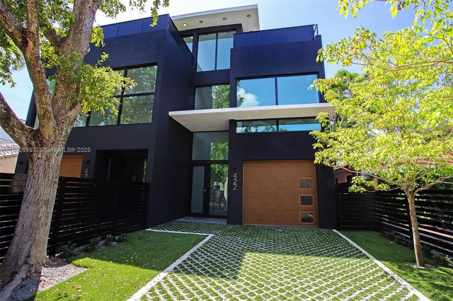 Front exterior of a new home in , Miami, FL, highlighting curb appeal (Image 34).