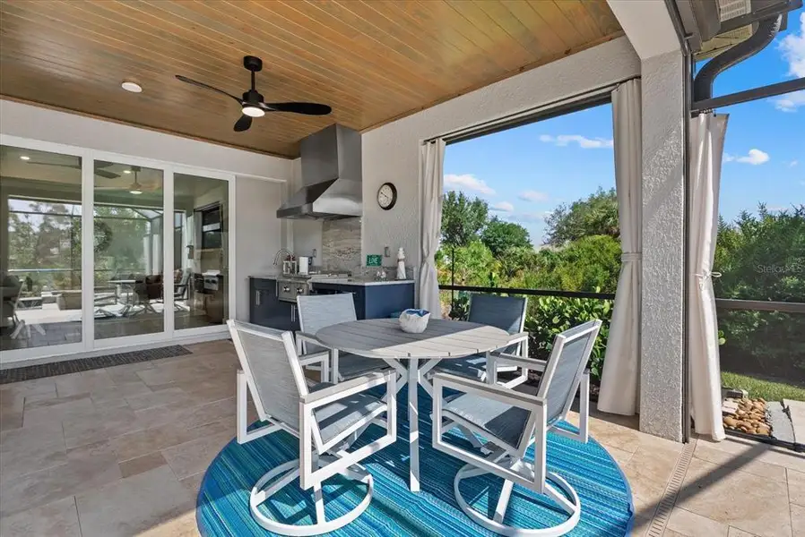 Exterior details and patio area of a home in , Englewood (Image 28).