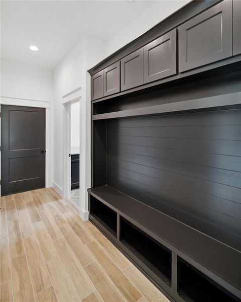 Mudroom with light wood-type flooring