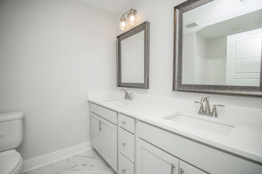 *Photo of example home. Selections and Finishes May Vary.* *Photo of example home. Selections and Finishes May Vary.*