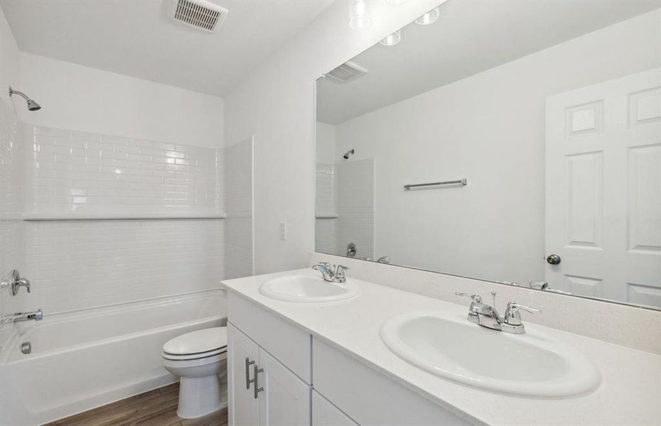 Upgraded secondary bathroom *real home pictured