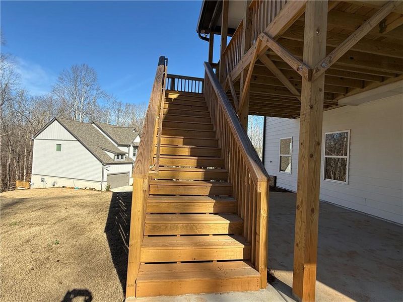 Exterior details and patio area of a home in River Rock, Ball Ground (Image 30).