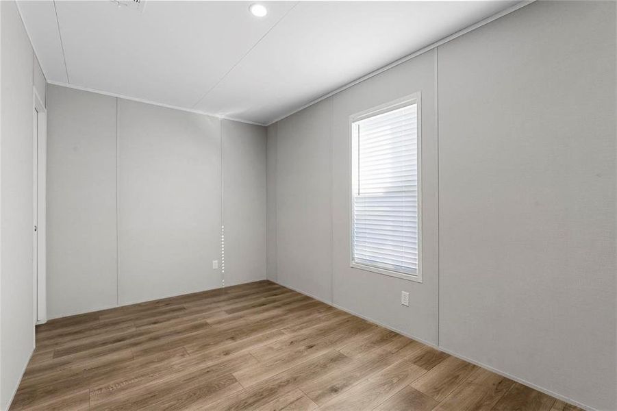 Empty room with wood finished floors