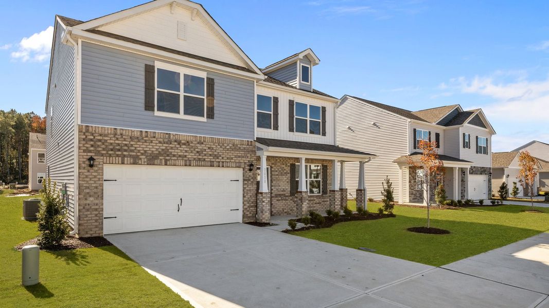 Front exterior of a new home in West New Bern, New Bern, NC, highlighting curb appeal (Image 21).