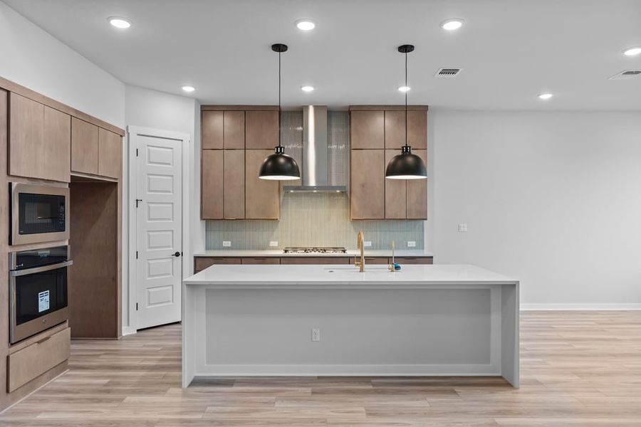 Furnished interior view inside a new home in Park Collection at Lariat, Liberty Hill (Image 15). Furnished interior view inside a new home in Park Collection at Lariat, Liberty Hill (Image 15).