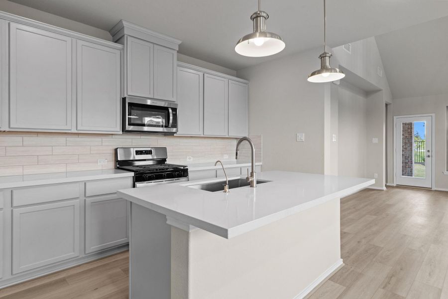 Furnished interior view inside a new home in Bridgeland, Cypress (Image 14).