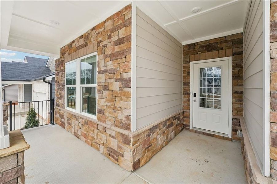 Exterior details and patio area of a home in Westmont Preserve, Powder Springs (Image 33).