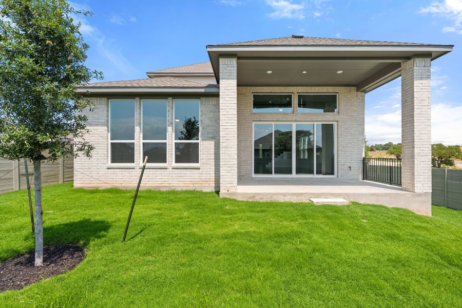 Exterior details and patio area of a home in Wolf Ranch, Georgetown (Image 31).