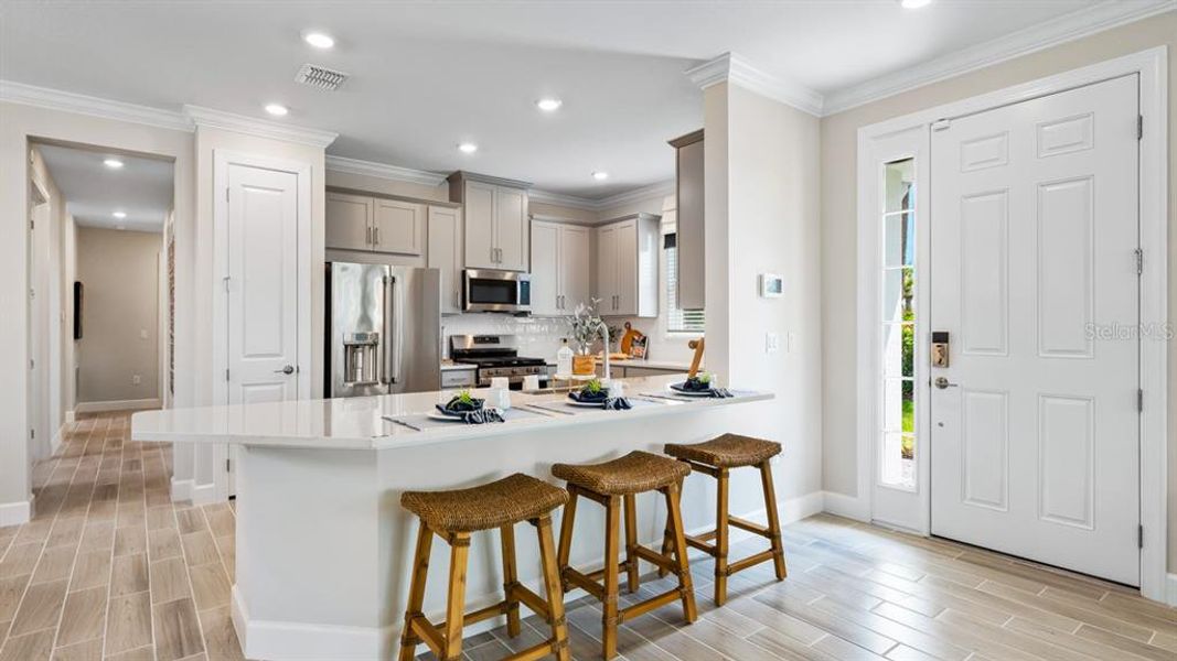Furnished interior view inside a new home in Esplanade at Wiregrass Ranch, Wesley Chapel (Image 4).