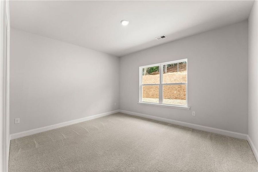 Representative unfurnished interior of a home built from the 2620 by Adams Homes in Williams Ridge, Bailey (Image 33). Representative unfurnished interior of a home built from the 2620 by Adams Homes in Williams Ridge, Bailey (Image 33).