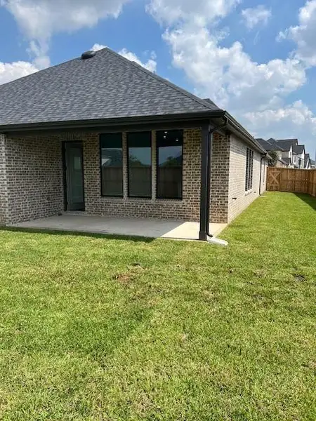 Front exterior of a new home in Katy Court, Katy, TX, highlighting curb appeal (Image 1). Front exterior of a new home in Katy Court, Katy, TX, highlighting curb appeal (Image 1).