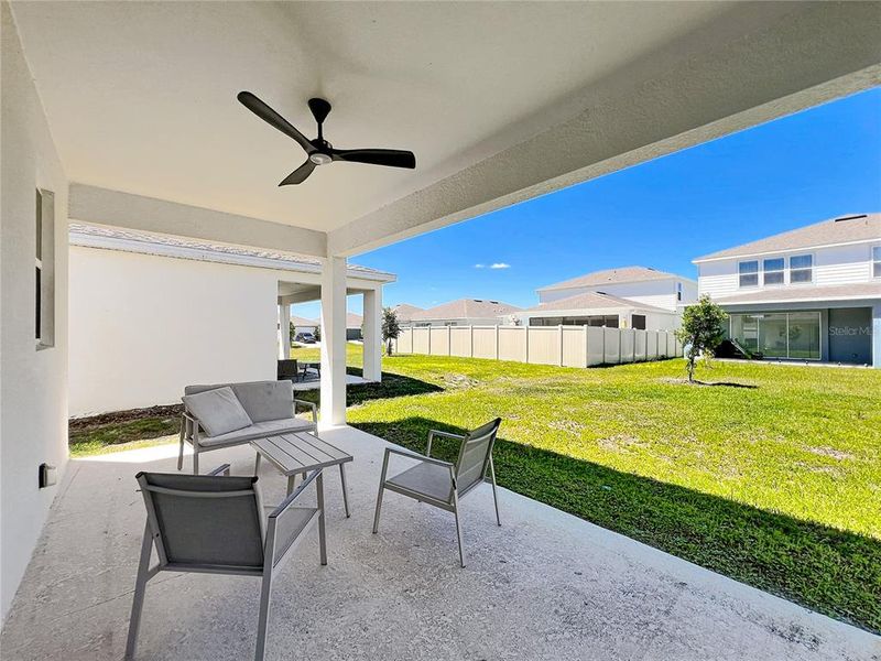 Exterior details and patio area of a home in Amelia Groves, St. Cloud (Image 23).