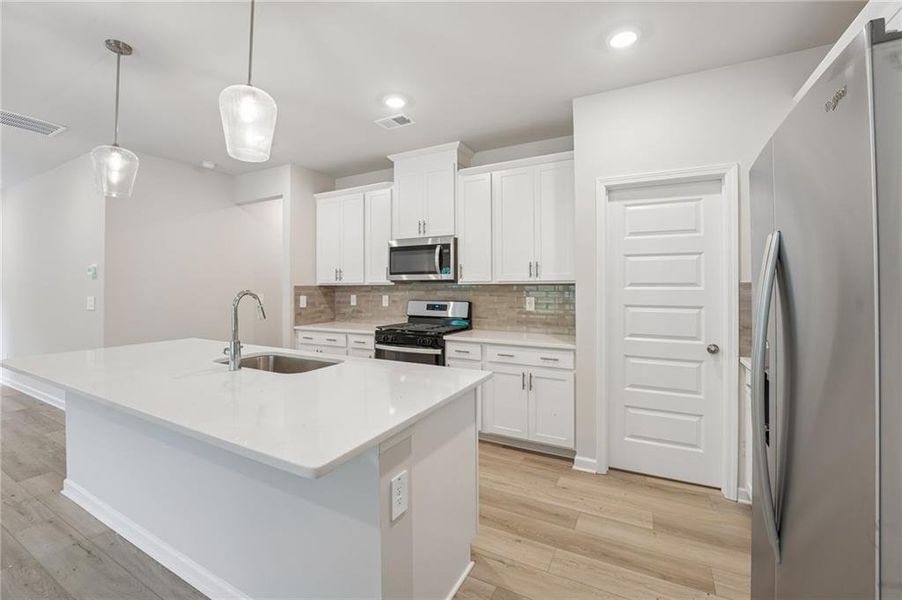 Furnished interior view inside a new home in Hemingway - Reserve Series, Cumming (Image 12). Furnished interior view inside a new home in Hemingway - Reserve Series, Cumming (Image 12).