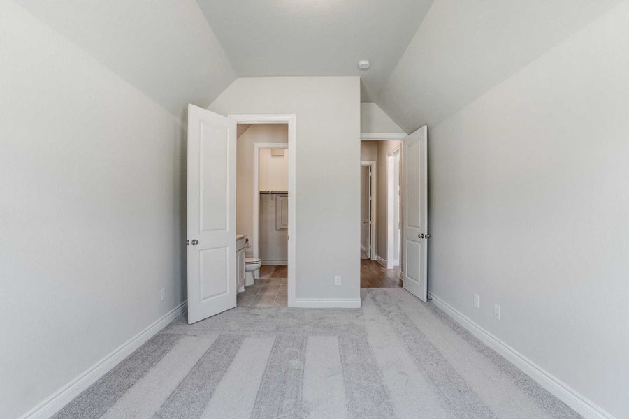 Representative unfurnished interior of a home built from the 2688 by Ravenna Homes in The Woodlands Hills 65′, Willis (Image 30).