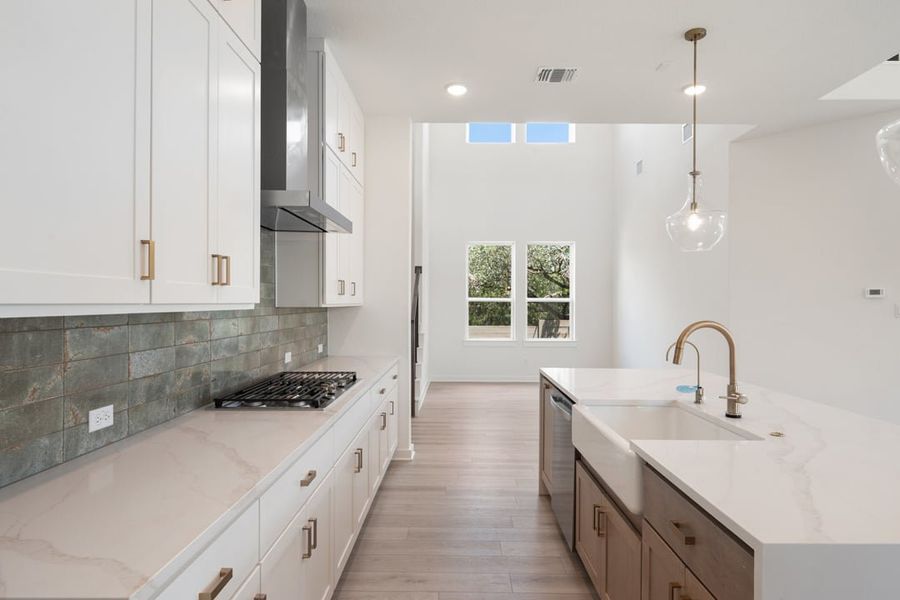Furnished interior view inside a new home in Arbor Collection At Wolf Ranch, Georgetown (Image 10).
