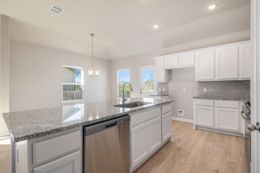 Furnished interior view inside a new home in Clear View Estates, Willis (Image 3).