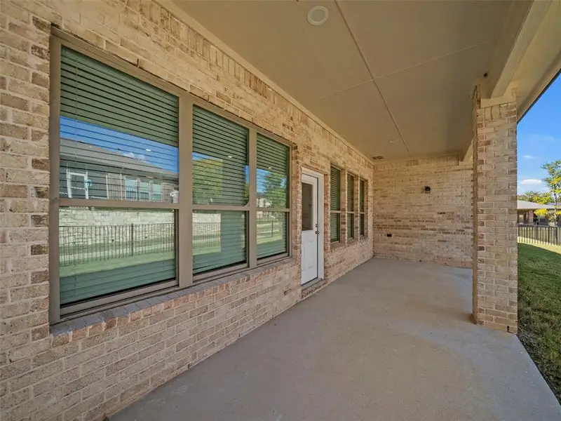 Exterior details and patio area of a home in , McKinney (Image 3).