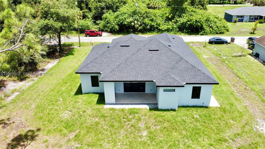 Exterior details and patio area of a home in , Lehigh Acres (Image 26). Exterior details and patio area of a home in , Lehigh Acres (Image 26).