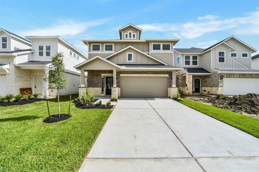 Front exterior of a new home in Anderson Lake, Houston, TX, highlighting curb appeal (Image 2). Front exterior of a new home in Anderson Lake, Houston, TX, highlighting curb appeal (Image 2).
