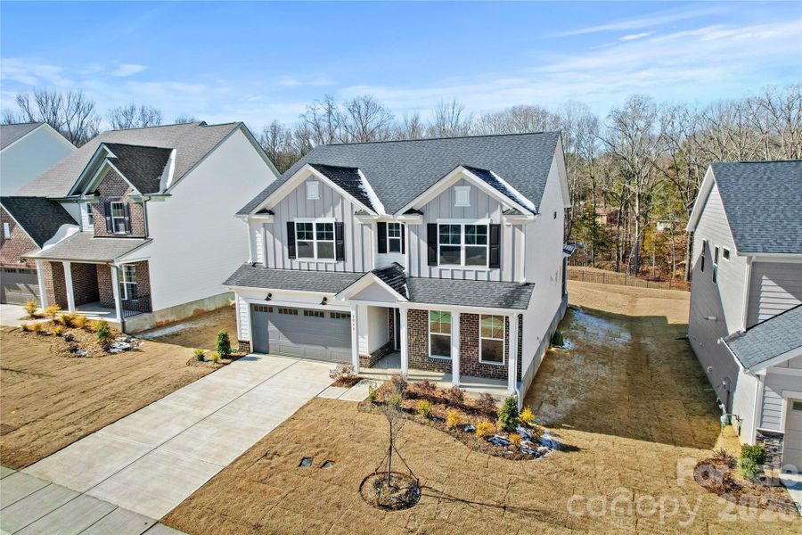Front exterior of a new home in Forest Creek, Waxhaw, NC, highlighting curb appeal (Image 24).