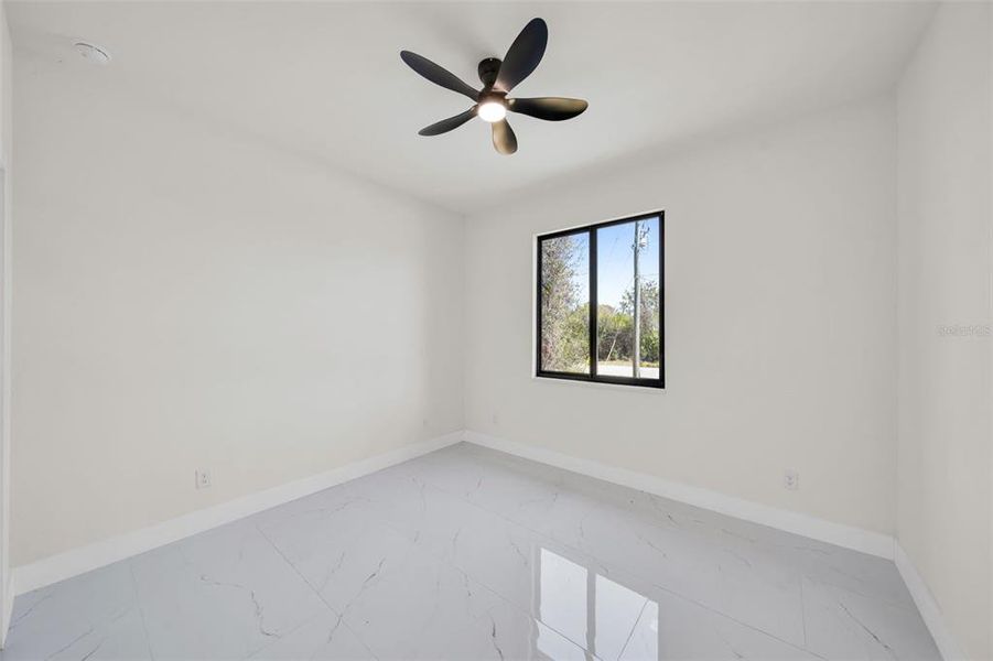 Spacious, unfurnished interior of a new home in , Port Charlotte (Image 32).