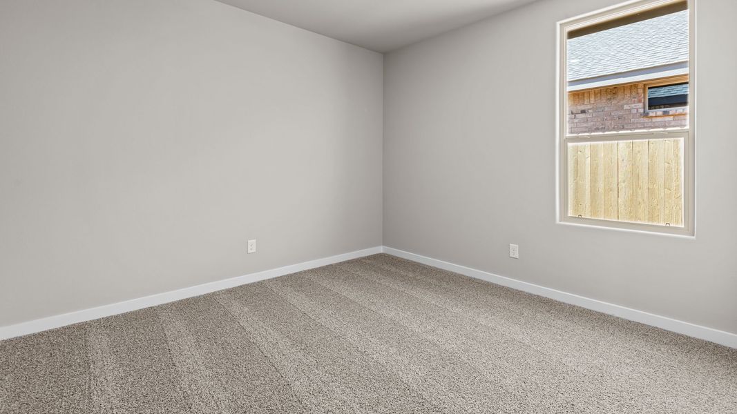 Representative unfurnished interior of a home built from the Jaxson by D.R. Horton in Legacy South, Midland (Image 24).