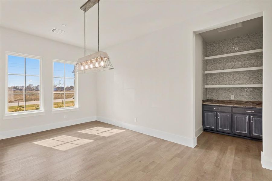 Spacious, unfurnished interior of a new home in Dean Farms, Lucas (Image 24).