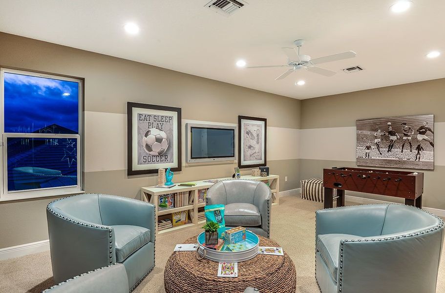 Representative furnished interior of a home built from the Kiawah 2 by Neal Communities in Boca Royale Golf & Country Club at Wellen Park, Englewood (Image 27).