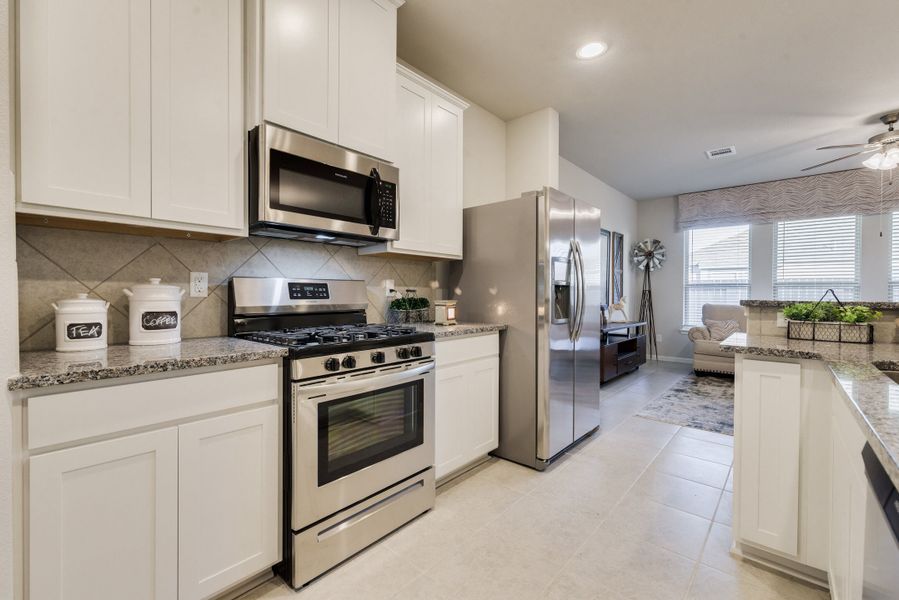 Representative furnished interior of a home built from the Floor Plan 1759 by Colina Homes in Grand Magnolia, Magnolia (Image 7). Representative furnished interior of a home built from the Floor Plan 1759 by Colina Homes in Grand Magnolia, Magnolia (Image 7).
