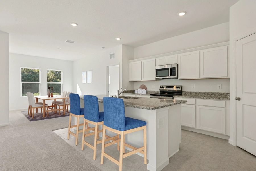 Representative furnished interior of a home built from the Equinox by Starlight Homes in Landings at Mount Olive, Polk City (Image 4). Representative furnished interior of a home built from the Equinox by Starlight Homes in Landings at Mount Olive, Polk City (Image 4).