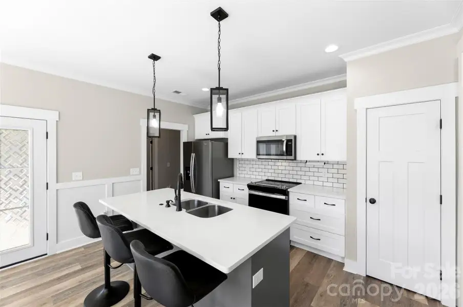 Quartz Countertops, Pantry and Custom Cabinets
