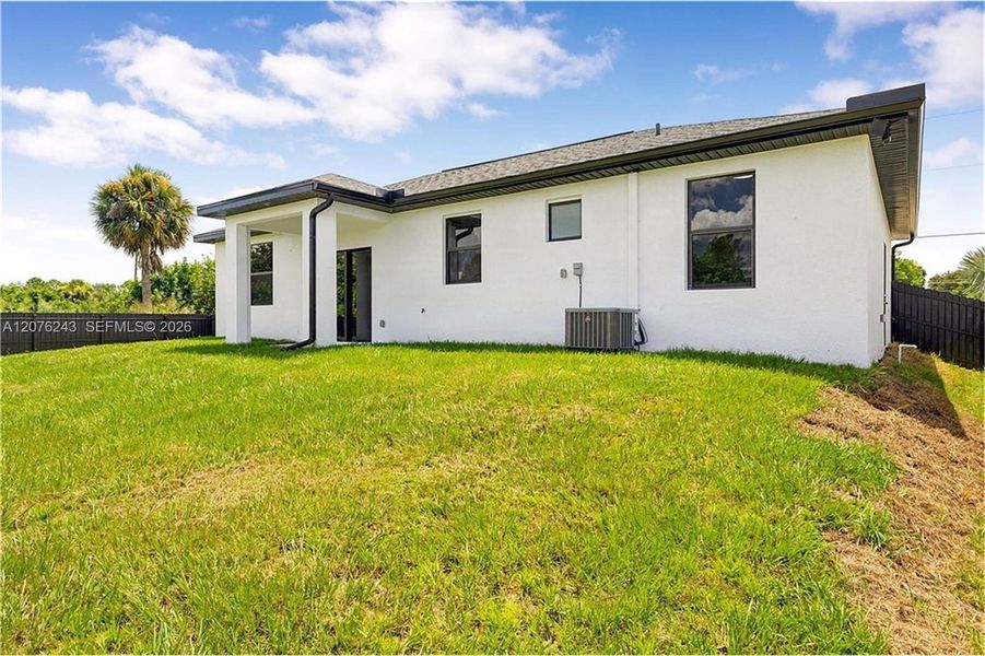 Exterior details and patio area of a home in , Lehigh Acres (Image 25).