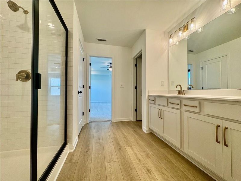 Furnished interior view inside a new home in Eastlyn Crossing, Flowery Branch (Image 8).