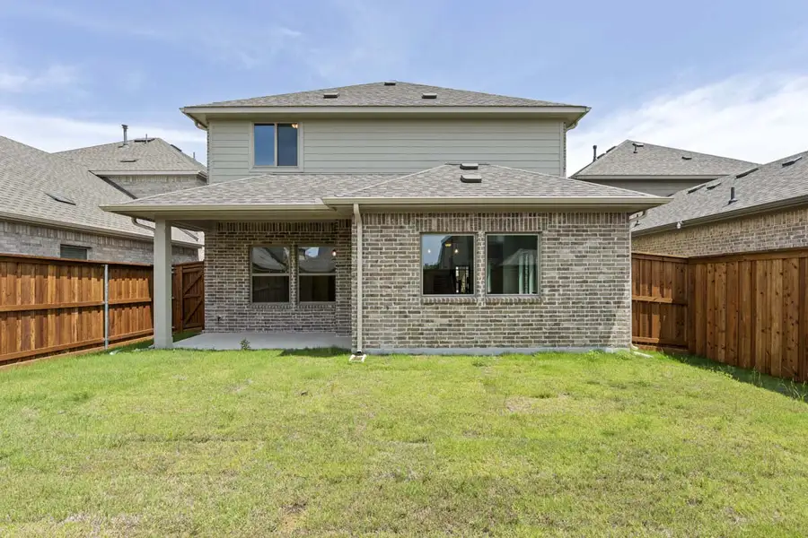 Representative exterior details of a home built from the Archer by Pacesetter Homes in The Reserve at Spiritas Ranch, Little Elm (Image 4). Representative exterior details of a home built from the Archer by Pacesetter Homes in The Reserve at Spiritas Ranch, Little Elm (Image 4).