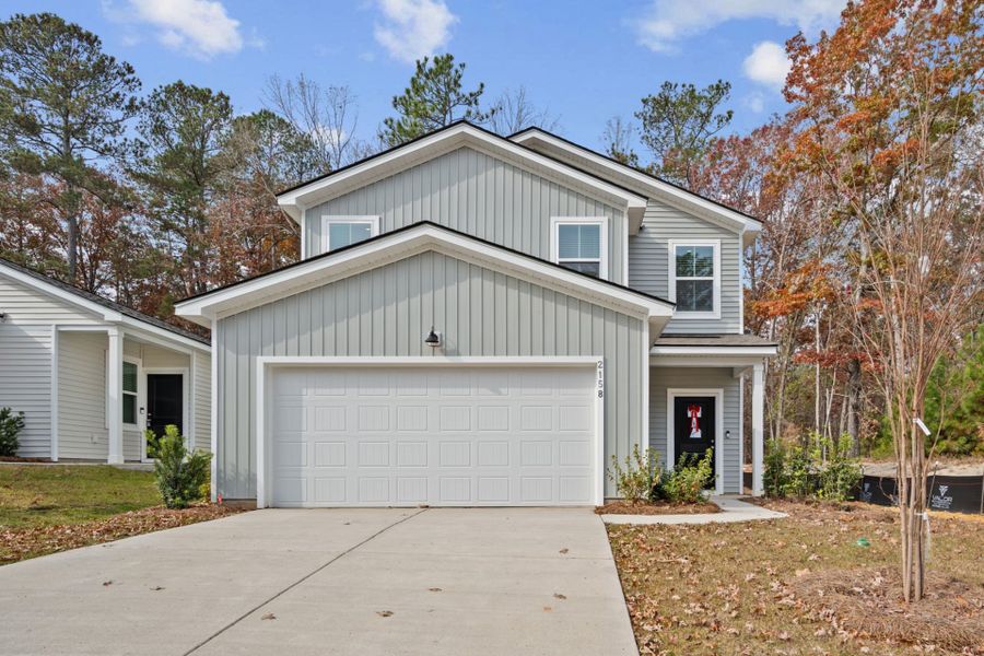 Front exterior of a new home in Grand Arbor, Blythewood, SC, highlighting curb appeal (Image 18).