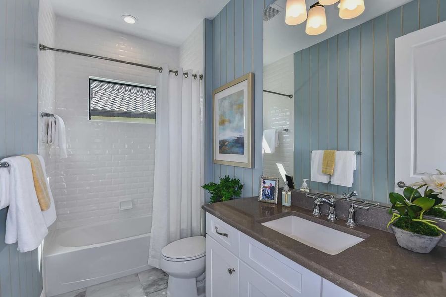 Furnished interior view inside a new home in Boca Royale Golf and Country Club at Wellen Park, Englewood (Image 11).