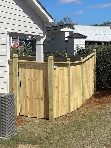 Exterior details and patio area of a home in Courtyards at Traditions, Cumming (Image 28).