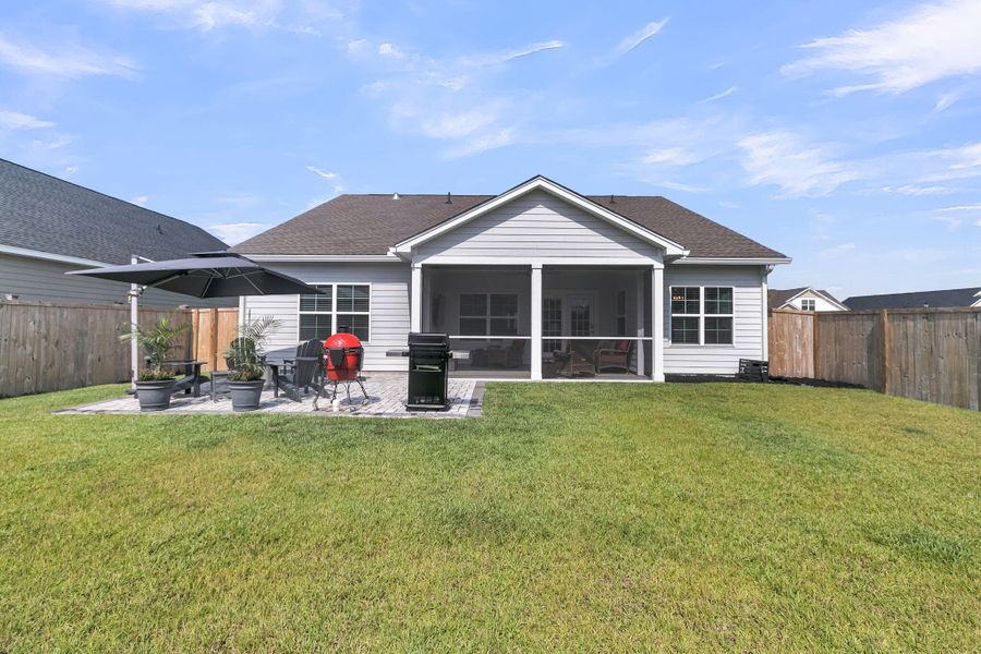 Front exterior of a new home in Hewing Farms, Summerville, SC, highlighting curb appeal (Image 21).