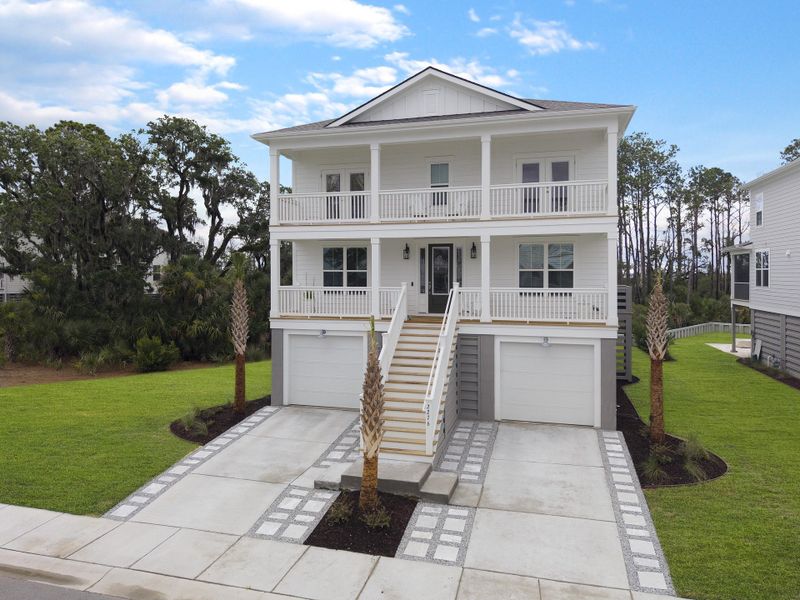 Front exterior of a new home in Liberty Hill Farm, Mount Pleasant, SC, highlighting curb appeal (Image 26).