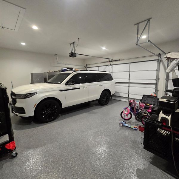 THREE CAR GARAGE WITH FINISHED FLOORING THREE CAR GARAGE WITH FINISHED FLOORING