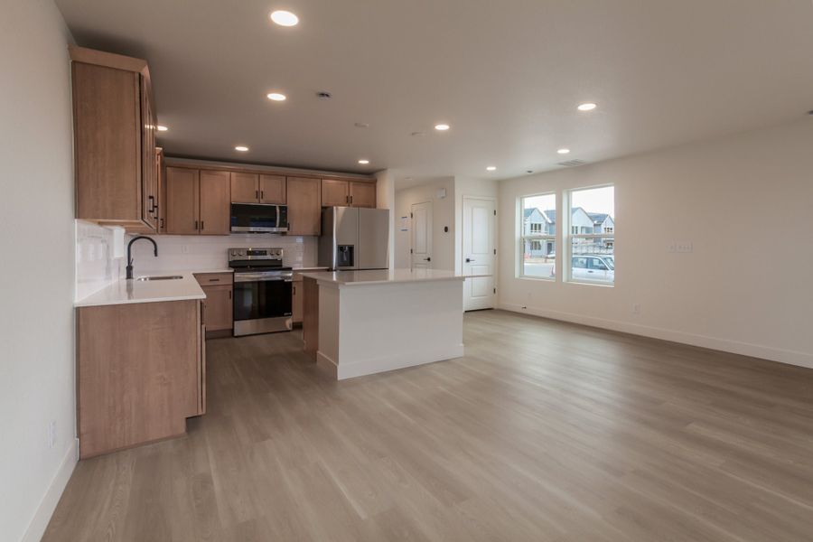 Furnished interior view inside a new home in Prairie Song Cottages, Windsor (Image 9).