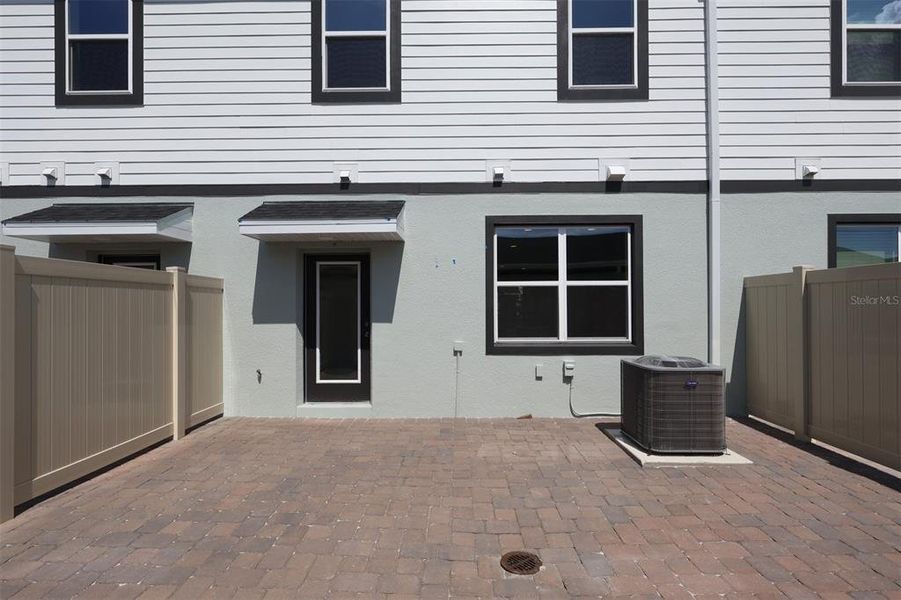 Exterior details and patio area of a home in Center Lake on the Park, St. Cloud (Image 16).