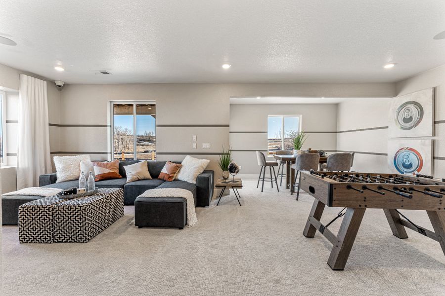 Representative furnished interior of a home built from the Roxborough by Taylor Morrison in Trailstone, Arvada (Image 6).