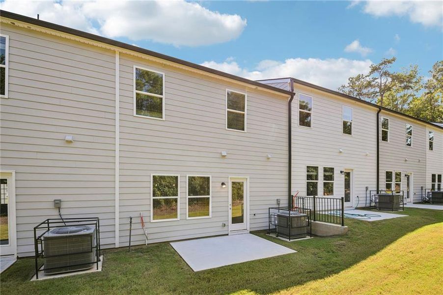 Exterior details and patio area of a home in Artisan Walk, Fairburn (Image 27).
