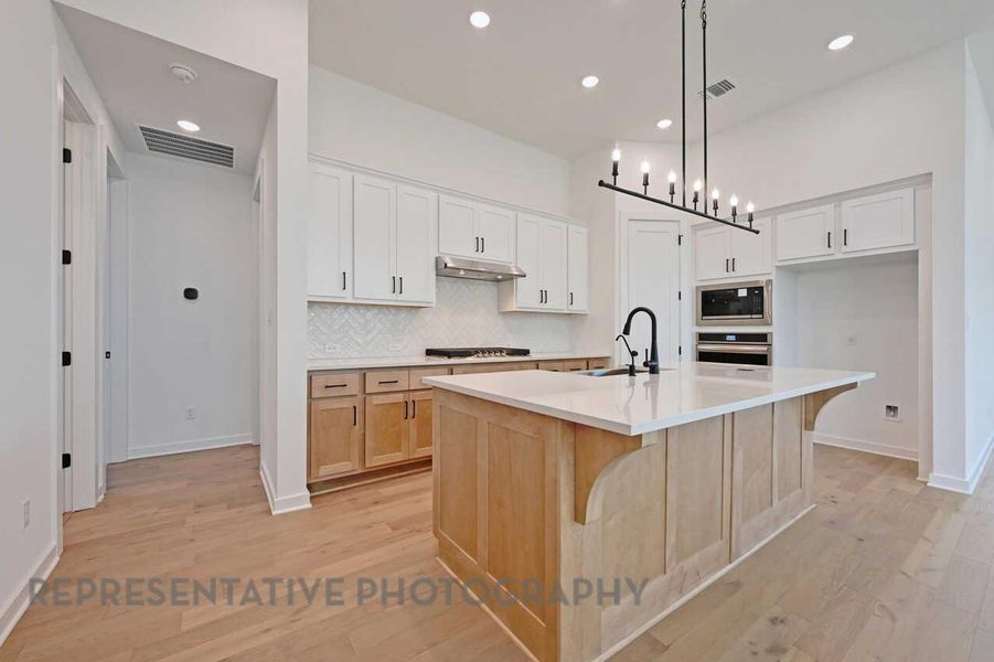 Furnished interior view inside a new home in Meridiana, Manvel (Image 3).
