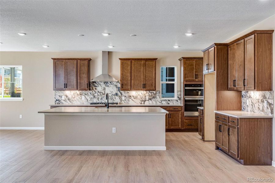 Furnished interior view inside a new home in Ensemble at The Aurora Highlands, Aurora (Image 3). Furnished interior view inside a new home in Ensemble at The Aurora Highlands, Aurora (Image 3).