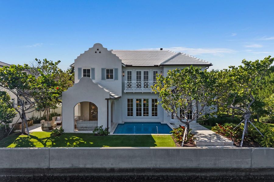 Front exterior of a new home in , Palm Beach, FL, highlighting curb appeal (Image 33). Front exterior of a new home in , Palm Beach, FL, highlighting curb appeal (Image 33).